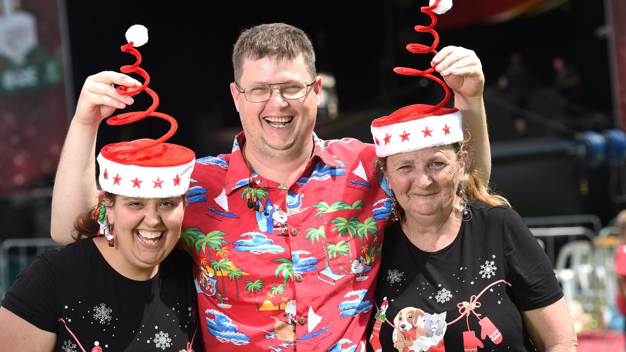 15/12/18 - Carols by Candlelight at Elder Park - Melissa Hann (29) pf Mawson Lakes, Daniel Pearman (33) of Elizabeth and Susan Tester (61) of Davoren Park. Photo - Naomi Jellicoe