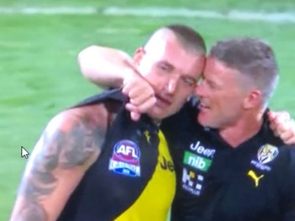 Dustin Martin looked near tears when embracing his coach.