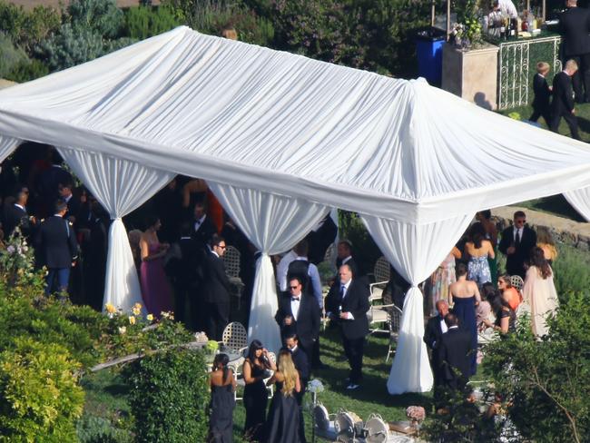 Jessica Simpson and Eric Johnson's wedding guests celebrate after their wedding nuptials.