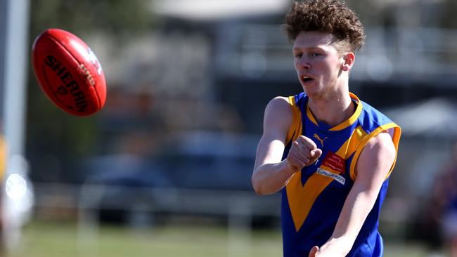 September 7, AFL Outer East (football) Premier Division 1st semi-final: Woori Yallock v Cranbourne.50 Nickolas Darbyshire handballs for Cranbourne.Picture: Stuart Milligan