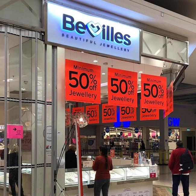 Shoppers queuing for a bargain at Bevilles in Epping.