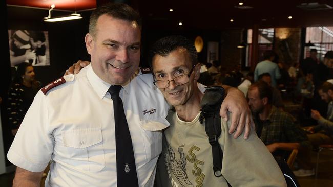 The Salvation Army’s Maj Brendan Nottle with a visitor to the Project 614 Night Cafe in Bourke St. Picture: Josie Hayden