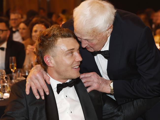 NCA. MELBOURNE, AUSTRALIA. September 23 , 2024.  The 2024 AFL Brownlow medal at the Palladium room in Crown Casino, Melbourne.   Patrick Cripps of the Blues is congratulated by Carlton legend John Nicholls  after winning the 2024 Brownlow Medal .       .  Pic:Michael Klein