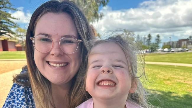 Maddy Morphett, who is about to start intensive oral cancer treatment for an extremely rare form of locally aggressive and invasive sarcoma, with her daughter Evelyn. Picture: Supplied