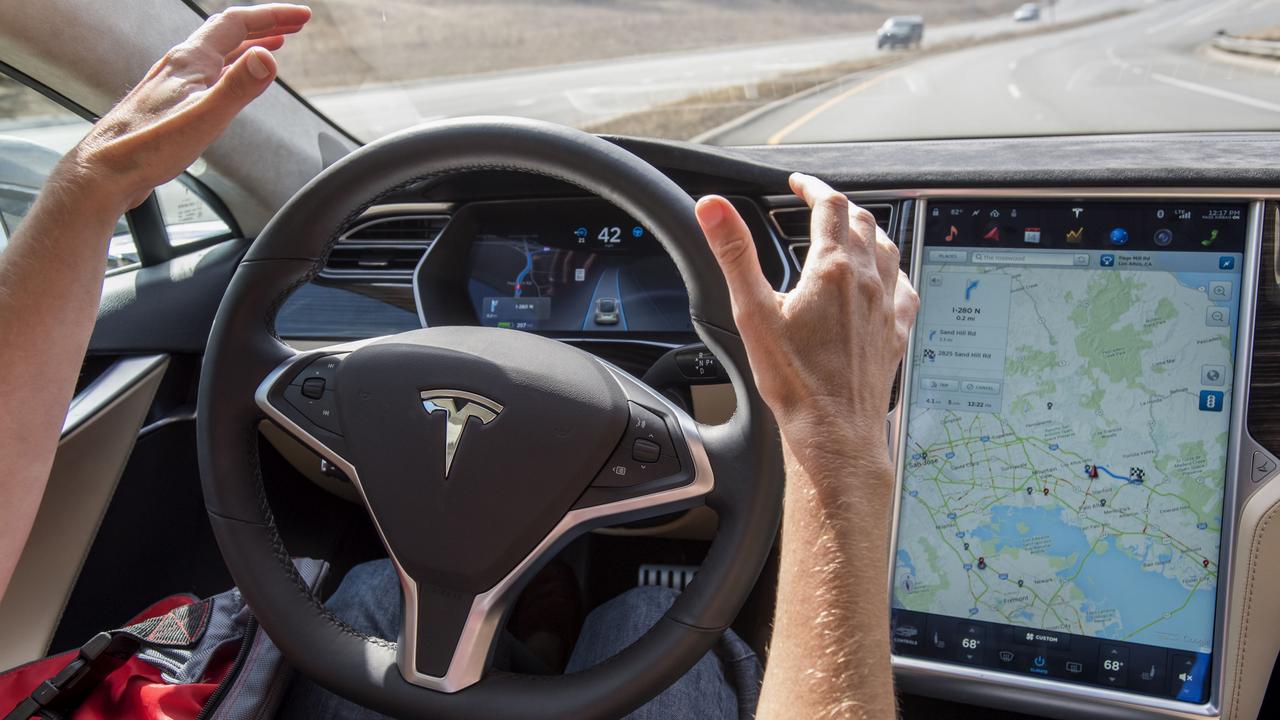 Advanced systems such as Tesla’s autopilot can help steer for you. Photo: David Paul Morris/Bloomberg