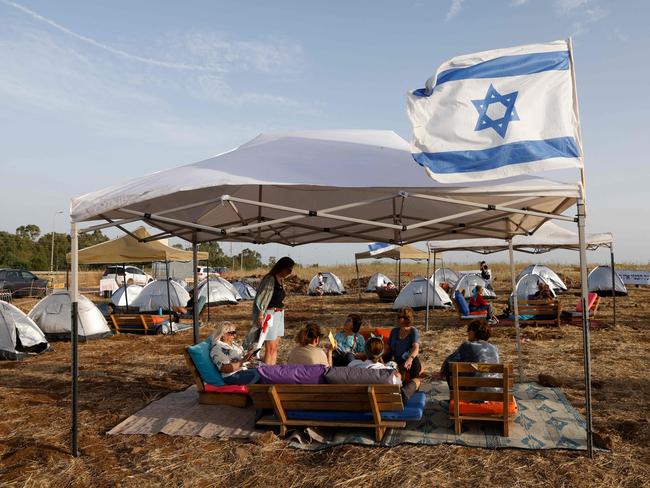 Israelis evacuated from northern areas near the Lebanese border due to ongoing cross-border tensions, take part in a rally near the northern Amiad Kibbutz, demanding to return home on May 23, 2024. Picture: AFP