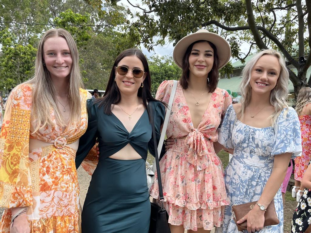 The girls having a ball at the Torbanlea Picnic Races.