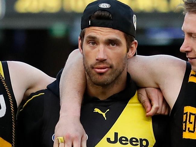 MELBOURNE, AUSTRALIA - SEPTEMBER 28: David Astbury, Alex Rance and Dylan Grimes of the Tigers celebrate during the 2019 Toyota AFL Grand Final match between the Richmond Tigers and the GWS Giants at the Melbourne Cricket Ground on September 28, 2019 in Melbourne, Australia. (Photo by Michael Willson/AFL Photos via Getty Images)