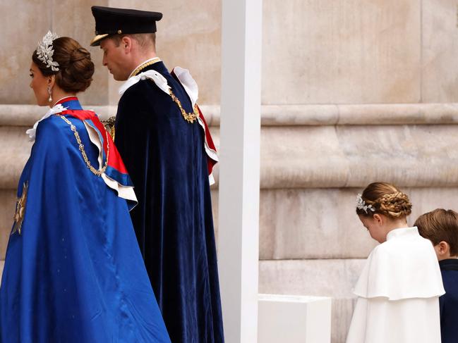 The future king and queen, Prince William and Princess Catherine, arrive with Princess Charlotte and Prince Louis. Picture: AFP