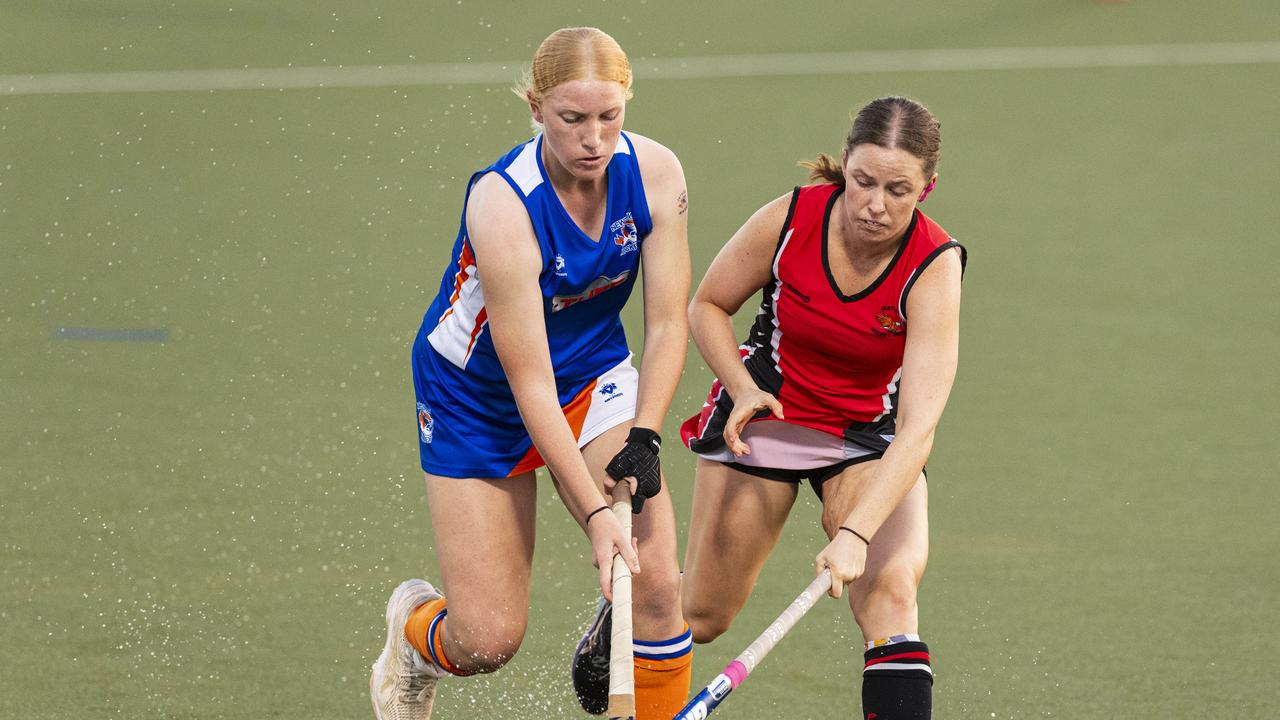 Erin Siebuhr (left) of Newtown against Past High in A1 Women's Toowoomba Hockey grand final at Clyde Park, Saturday, September 7, 2024. Picture: Kevin Farmer