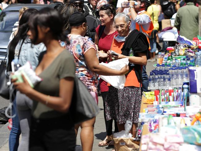 People drop off donations of food and drink at makeshift centres where many are looking for news of loved ones. Picture:  AFP/ DANIEL LEAL-OLIVAS