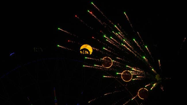 Fireworks illuminate the sky behind a ferris wheel on New Year's Eve in the southern Iraq city of Basra. Picture: AFP