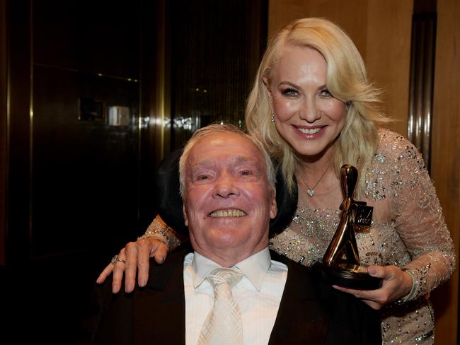 Kerri-Anne Kennerley and John Kennerley pose for photographs with her Gold Logie for the TV Week Logie Hall of Fame during the 2017 Logie Awards at the Crown Casino in Melbourne, Sunday, May 8, 2016. (AAP Image/Tracey Nearmy) NO ARCHIVING