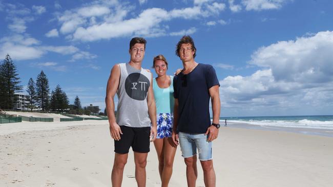 Gold Coast sporting family Joel, Gretel, and Kurt Tippett. Kurt plays for the Sydney Swans, Joel for North Melbourne and Gretel is with the Queensland Firebirds. The trio home for Christmas with parents Tony and Janet. Pics Tim Marsden