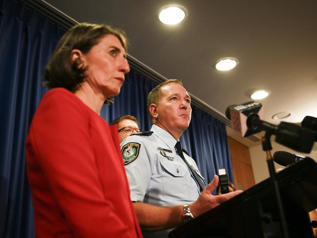 Mick Fuller with NSW Premiere Gladys Berejiklian and Police Minister Troy Grant. Picture: Dylan Robinson