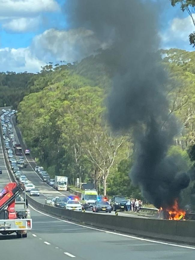 Traffic held up north-bound on Mt Ousley Rd, massive car fire. Emergency services on scene now #wollongong, Picture: Supplied via Twitter Claudia Hirst, @claudiahirst98