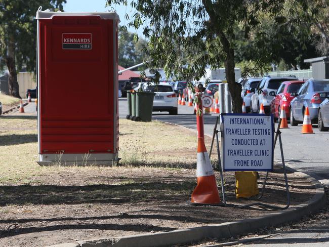 A banked-up Covid testing clinic at Ridgehaven, SA, with limited bathroom facilities, one red portaloo is being used on site. Picture: NCA NewsWire / Emma Brasier