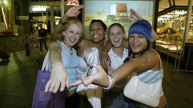 31 Dec 2003 New Year's Eve celebrations in the Queen Street Mall, Brisbane l/r - Friends Jacinta Deinnocentis 15, Juanita Kapernick 14, Jasmine-Louise Anderson and Waynea Notise 14 PicAnnette/Dew - women revellers