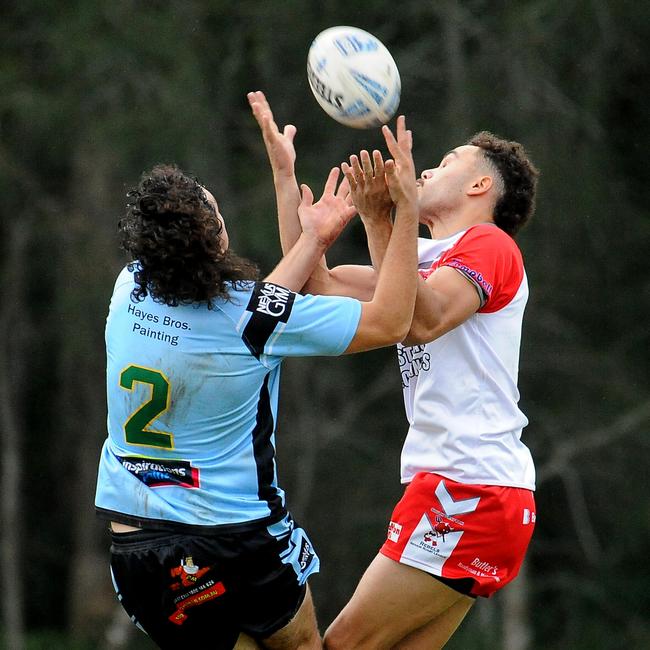 Woolgoolga's Kade Levingstone and South Grafton's Jamal Laurie compete for the ball. Picture: Leigh Jensen