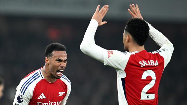 Gabriel and William Saliba of Arsenal celebrate at full-time following the team's victory in the Premier League match between Arsenal FC and Tottenham Hotspur FC at Emirates Stadium on January 15, 2025 in London, England. (Photo by Justin Setterfield/Getty Images)