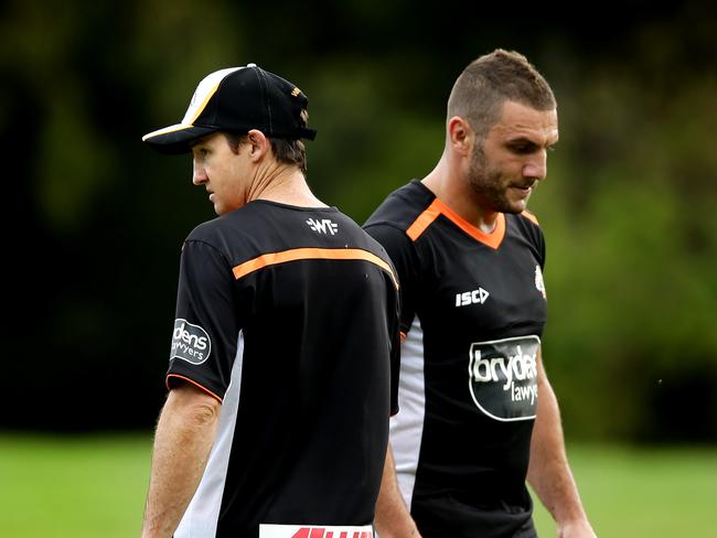 Robbie Farah and Tigers coach Jason Taylor during the Wests Tigers first pre season training session in Leichhardt .Picture Gregg Porteous