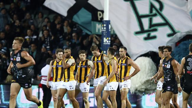 Hawthorn players hang their heads after another Port Adelaide goal. Picture: Sarah Reed