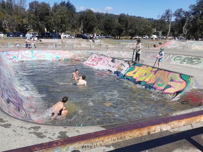 Umina Skatepark: Kids took advantage when weekend rain filled Umina Skatepark with water. Picture: Renee Barker.