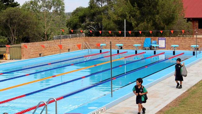 Students at Warwick Christian College getting ready for a swimming lesson. Picture: Marian Faa