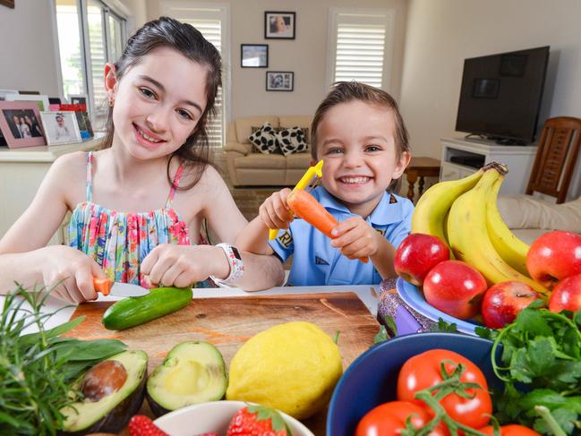 Alannah 8yo and Joshua 3yo Edwards learning crucial food skills with the 12 before 12 program, October 3, 2020. Picture: Brenton Edwards