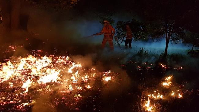 Firefighters from Cudgen Rural Fire Brigade on the job at Terragon in the Tweed last night. Picture: Cudgen Rural Fire Brigade