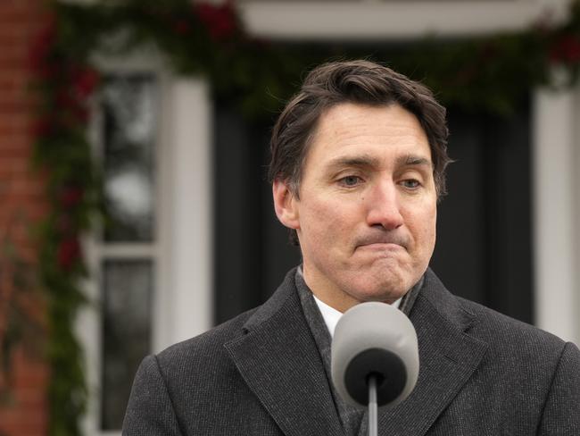 Canada Prime Minister Justin Trudeau makes an announcement outside Rideau Cottage in Ottawa on Monday, Jan. 6, 2025. (Adrian Wyld/The Canadian Press via AP)