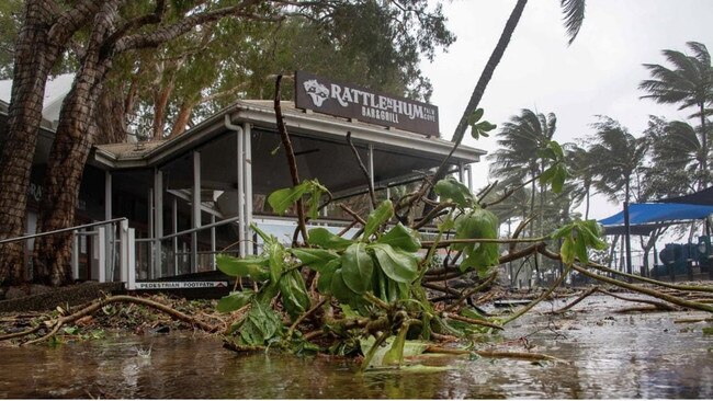 Palm Cove near Cairns on December 13 just prior to Jasper’s arrival. Picture: Brian Cassey / AFP