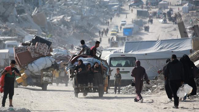 Palestinians move with their belongings through Jabalia as they flee the northern Gaza Strip towards Gaza City. Picture: AFP