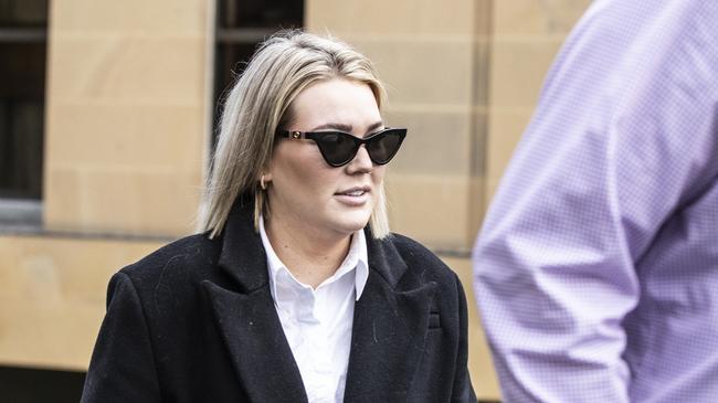 Olivia Rose Rodgers, beautician for Judgment on fraud related charges is shown on her way to the Supreme Court of Tasmania on Monday morning.