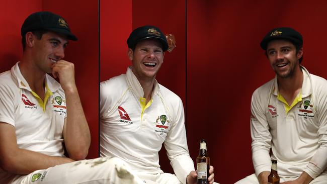 Travis Head, right, celebrates the Ashes series victory with Pat Cummins and Steve Smith at Old Trafford. Picture: Ryan Pierse/Getty Images