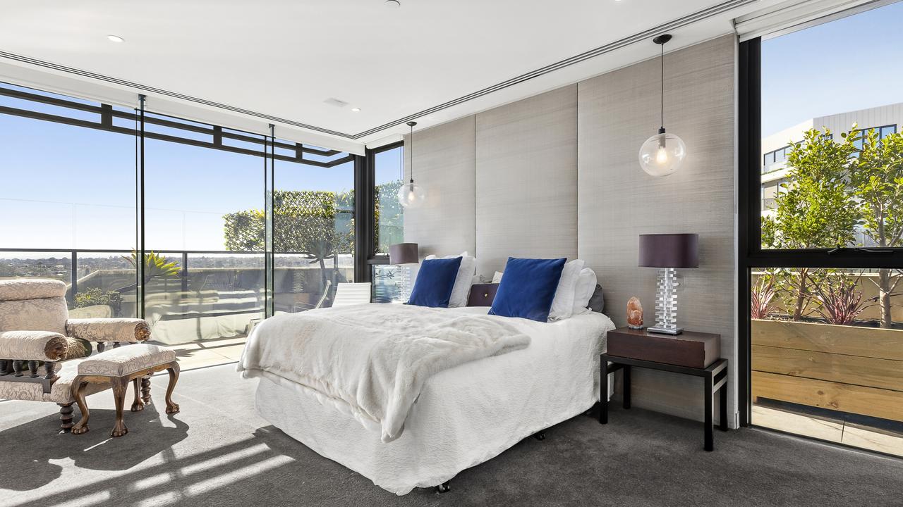 There’s three bedrooms with the main bedroom offering Melbourne city views.