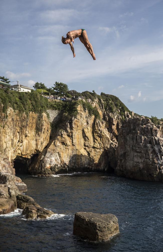 Kris Kolanus of Poland diving from the 28 metre platform during the first competition day of the eighth stop of the Red Bull Cliff Diving World Series at Shirahama, Japan. Picture: AFP PHOTO / Romina AMATO/Red Bull