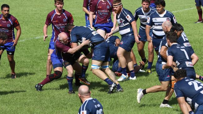Dennis Bree makes a tackle during Swampdogs Round 12 B-Grade clash with Casuarina at Rugby Park. Picture: NT Rugby