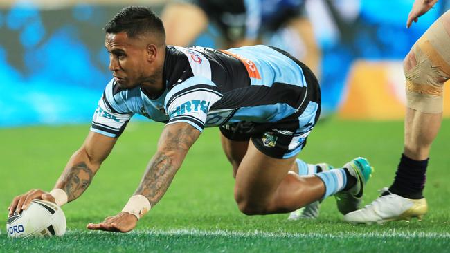 Ben Barba scores the opening try for the Sharks off Paul Gallen’s pass. Picture: Mark Evans