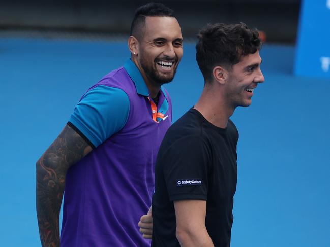 Nick Kyrgios shares a joke with doubles partner Thanasi Kokkinakis. Picture: Michael Klein