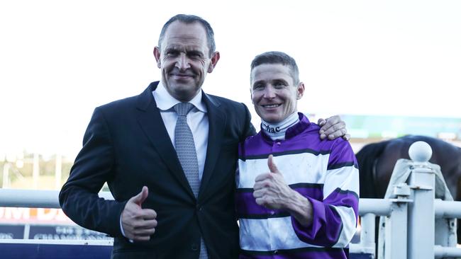 Chris Waller and James McDonald celebrate to win of Riff Rocket in the Group 1 Australian Derby.