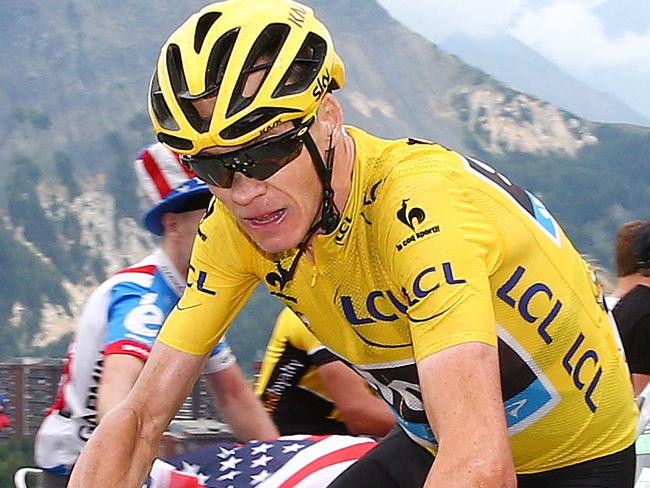 Tour de France - stage 19 - Saint-Jean-De-Maurienne to La Toussuire. The yellow jersey of Christopher Froome makes his way up the last 4km towards the finish line. Photo Sarah Reed.