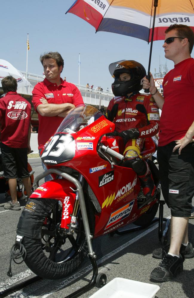 Marquez with mentor Emilio Alzamora on the grid at a CEV race.