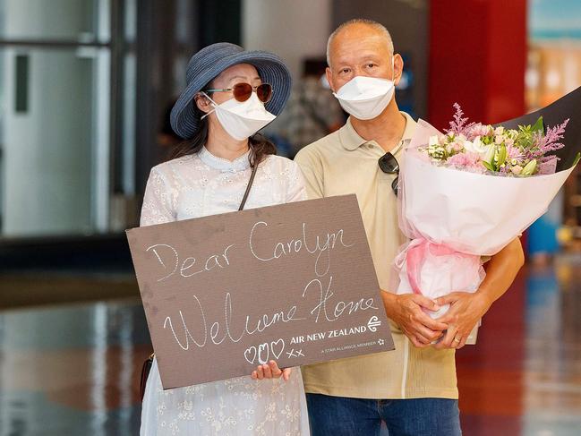 Relatives wait at the arrivals hall to welcome loved ones on the first day of New Zealanders returning from Australia. Picture: AFP