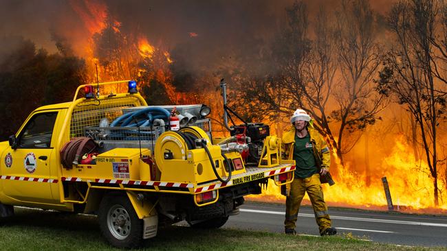 Firefighters on scene near Peregian Beach in October. Picture: Lachie Millard