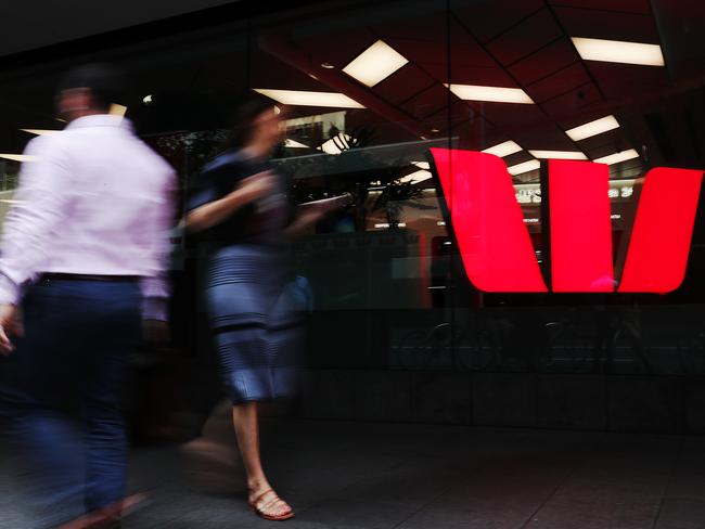 SYDNEY, AUSTRALIA - NOVEMBER 26: Pedestrians walk past a Westpac bank on November 26, 2019 in Sydney, Australia. Westpac has announced that chief executive Brian Hartzer will step down and chairman Lindsay Maxsted will leave the board early following the launch of an investigation by Australia's financial intelligence agency - AUSTRAC - over a money laundering and child exploitation scandal. AUSTRAC alleges the bank breached anti-money laundering laws 23 million times, including failing to adequately vet thousands of payments potentially linked to child exploitation. (Photo by Mark Metcalfe/Getty Images)