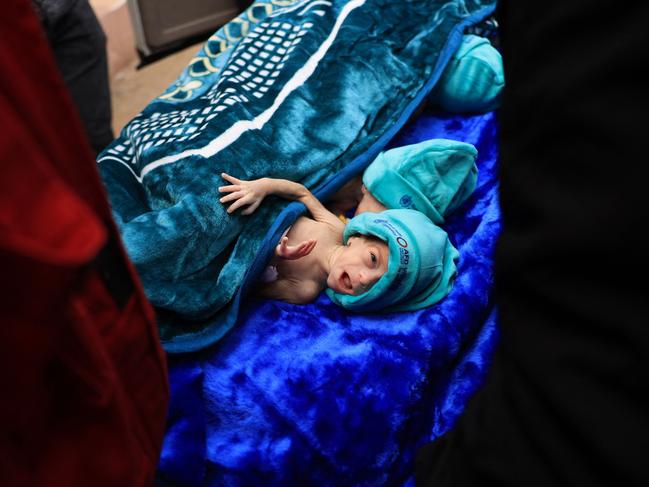 Palestinian medics prepare premature babies, evacuated from Gaza City's Al Shifa hospital, for transfer from a hospital in Rafah in the southern Gaza Strip to Egypt. Picture: AFP