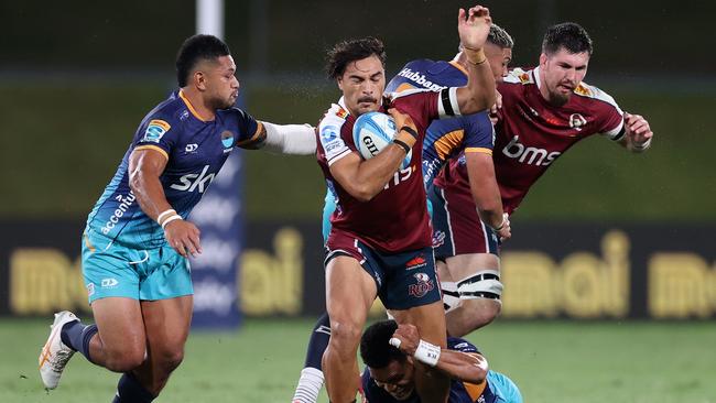 Jordan Petaia (centre) is set to miss the rest of the Super Rugby Pacific season. Picture: Fiona Goodall/Getty Images