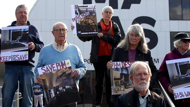 People gather on the steps outside the Powerhouse Museum in Ultimo to protest the museum's move to Parramatta. Picture: Toby Zerna