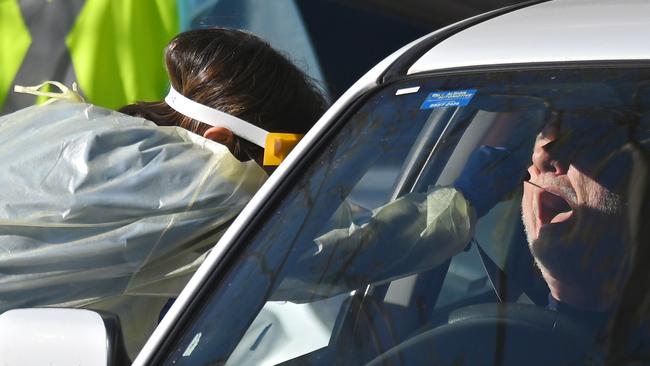 SYDNEY, AUSTRALIA - NewsWire Photos SEPTEMBER 1, 2020: Members of the public are tested for Coronavirus (COVID-19) by health workers at a drive-through testing clinic in Rozelle. Picture: NCA NewsWire / Steven Saphore